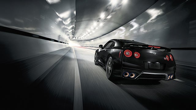 2023 Nissan GT-R seen from behind driving through a tunnel | Fort Worth Nissan in Fort Worth TX