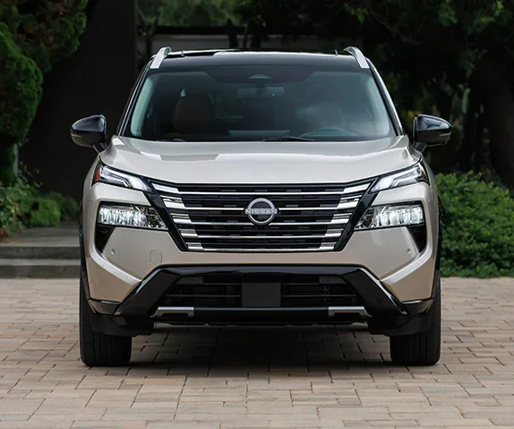 A brown suv sitting parked.