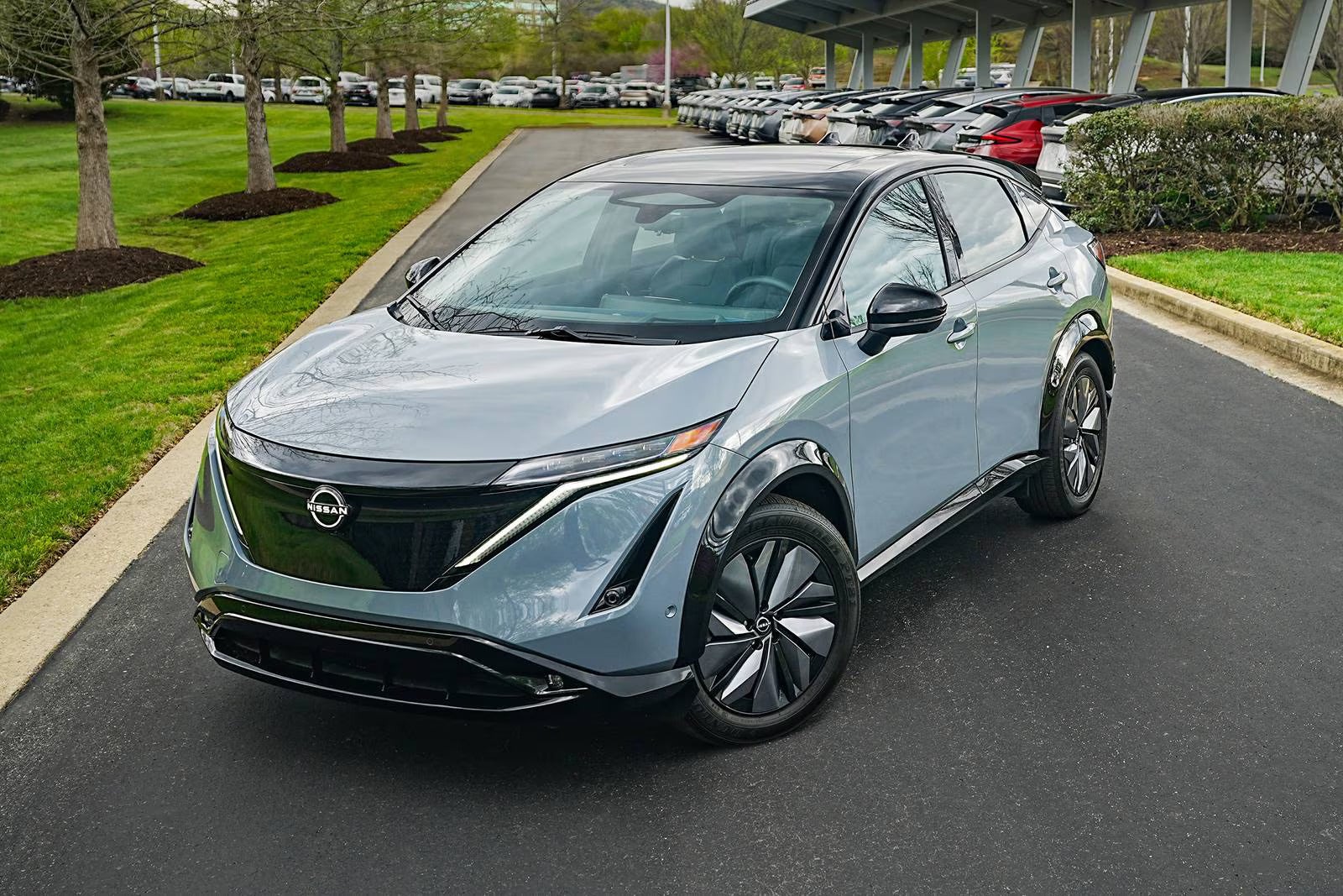 A gray car sitting parked.