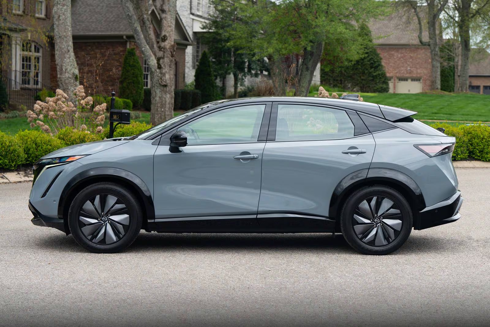 A gray car sitting parked.