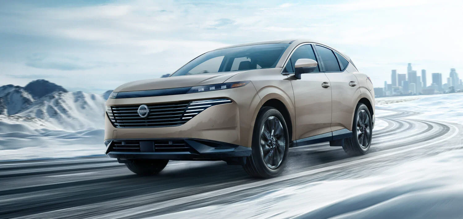 2025 Nissan Murano driving through snow showing its all-wheel drive capabilities