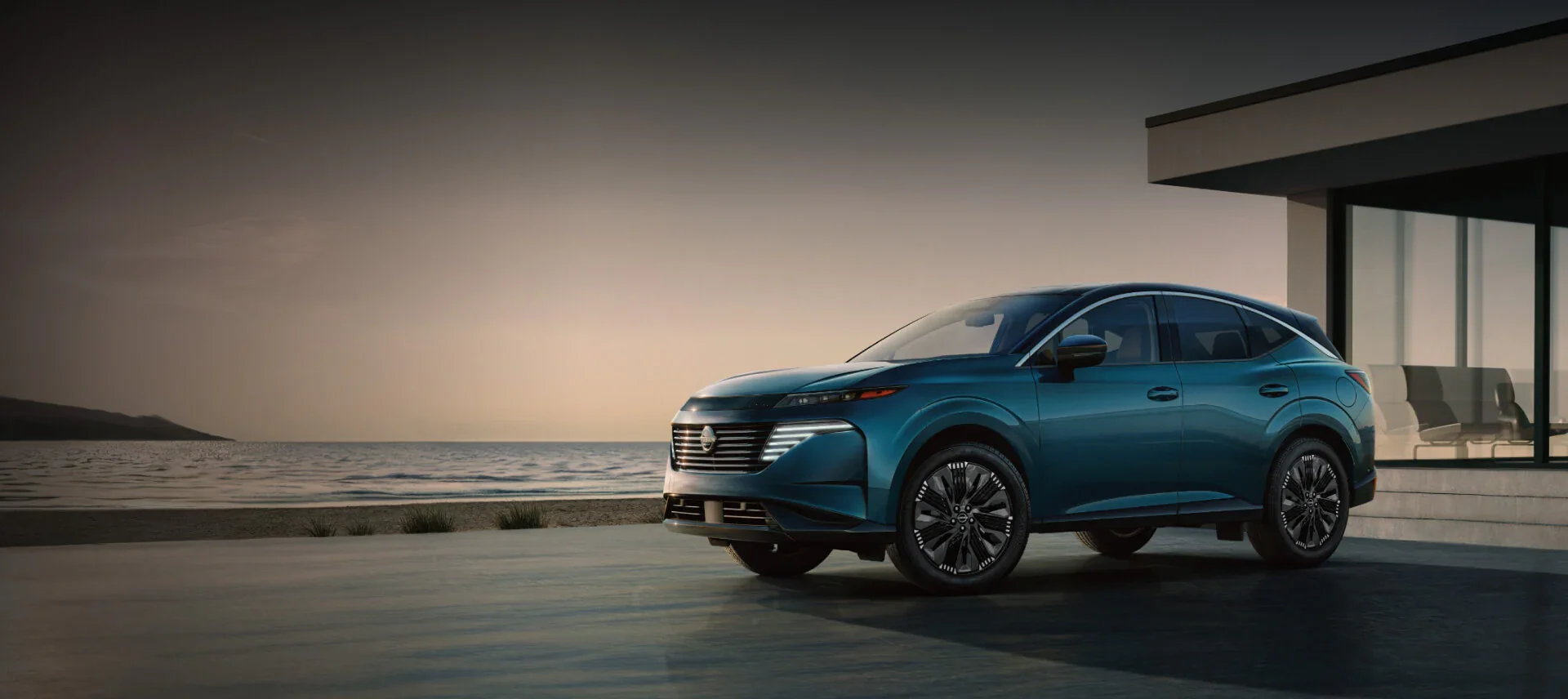 2025 Nissan Murano in driveway of oceanside home