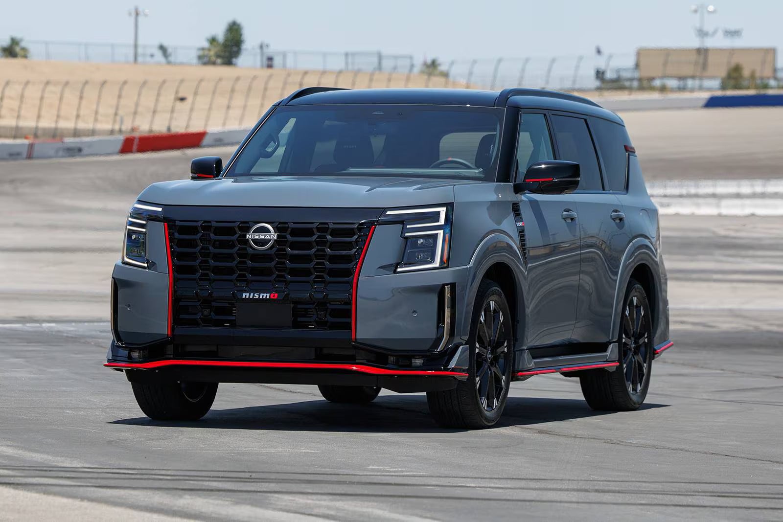 A gray car sitting parked.